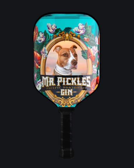 A paddle carrying a Mr. Pickles gin label with a portrait of a dog in a gilt frame
