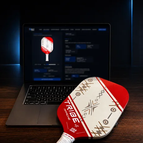 The TRIBE paddle being specified in the iMPACT Build Room on a laptop