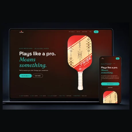 The TRIBE ecommerce storefront shown on a desktop screen beside a phone